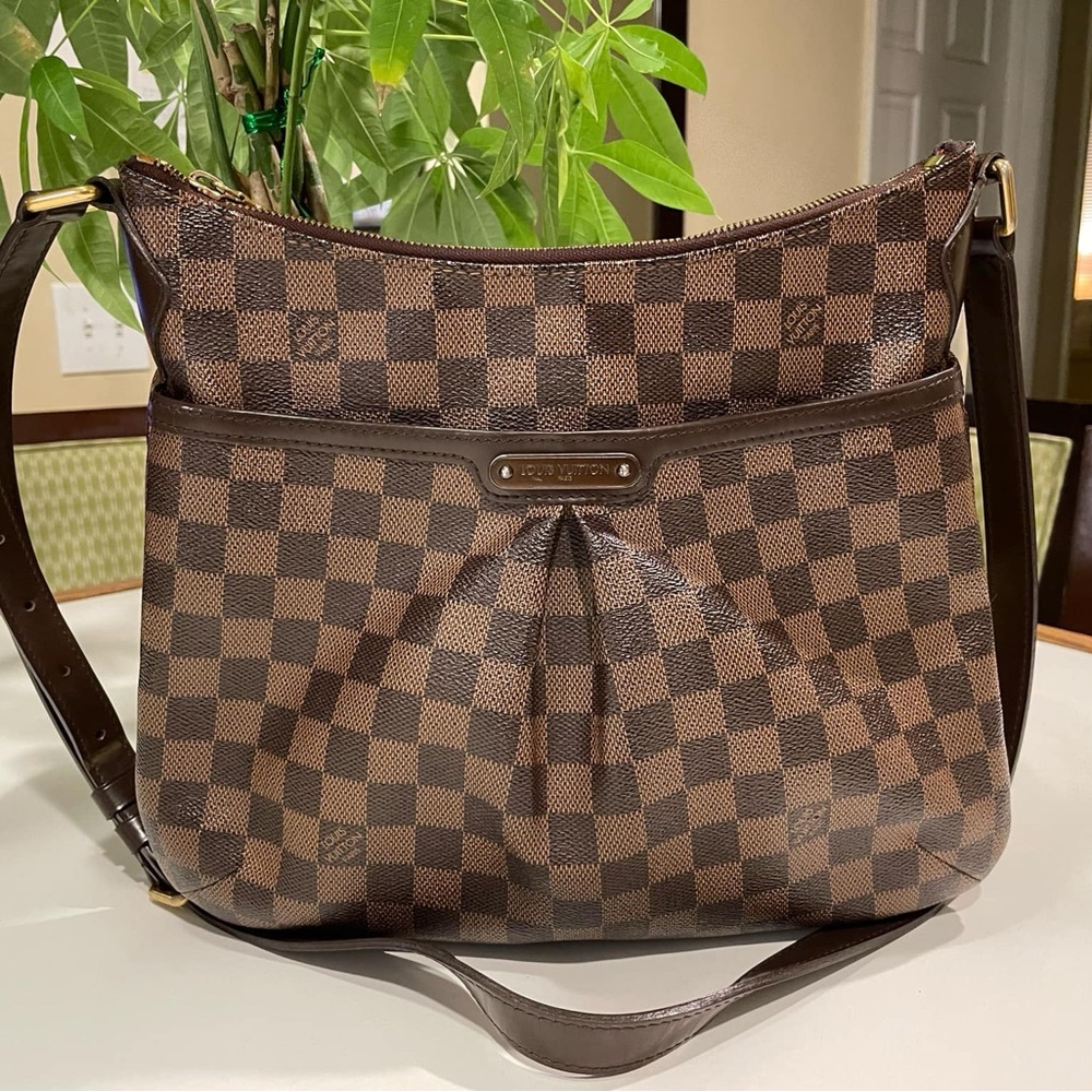Authentic Louis Vuitton Brown crossbody bag feel free to send offer.